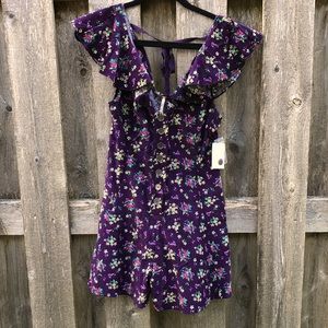 This is a free people, romper/dress. Never worn!